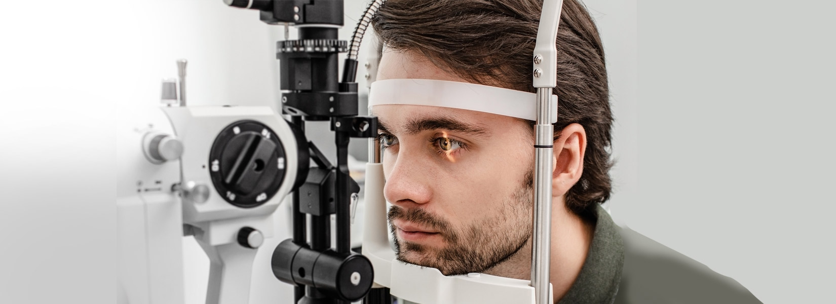 young man during eye exam in Acton